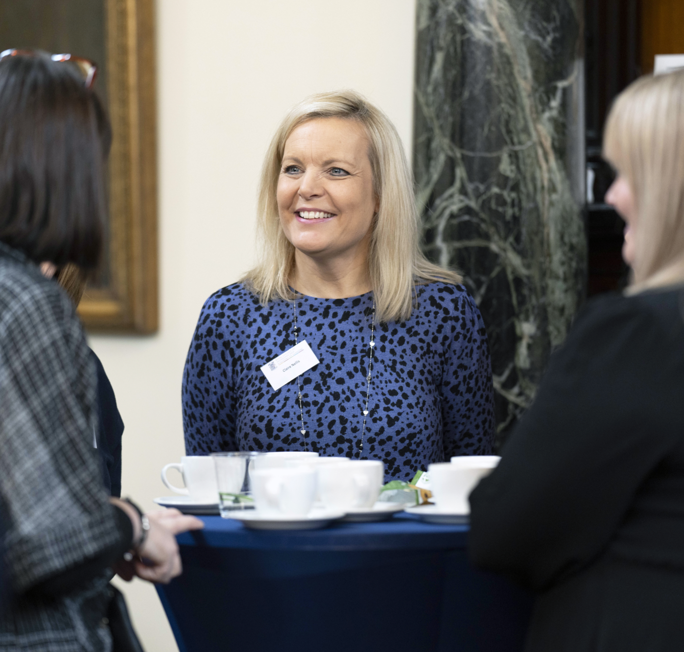 Women chatting and smiling