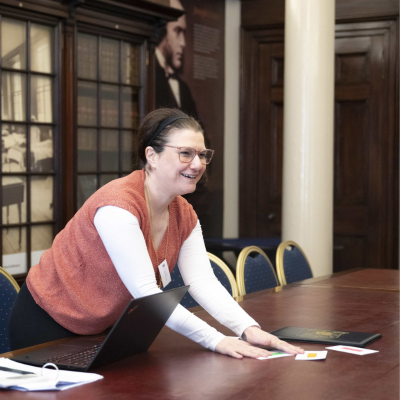 a woman smiling doing an activity