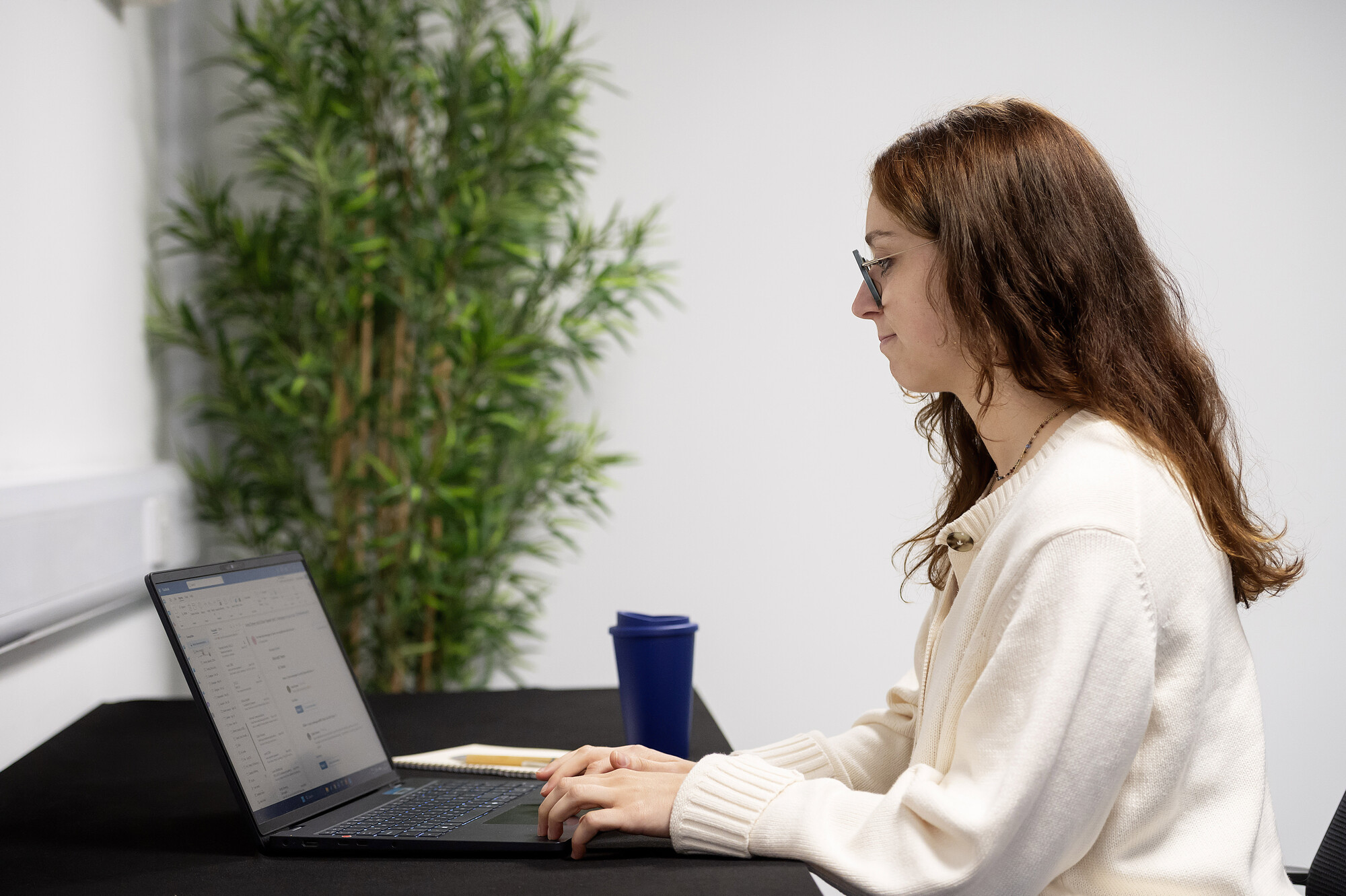 Woman working at her laptop