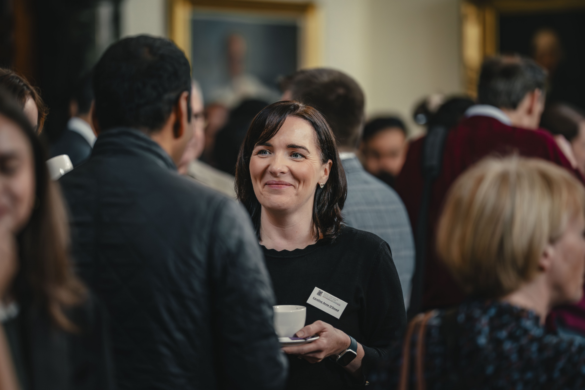 People chatting at an event