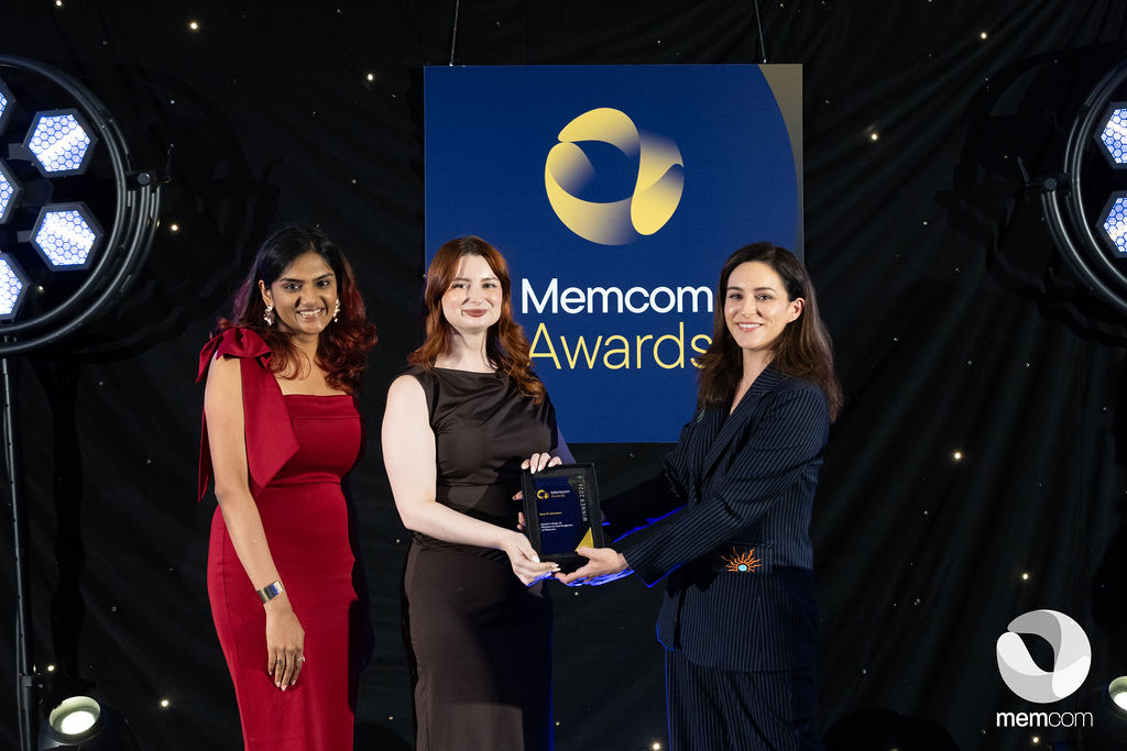College team accepting award for Best Publication at Memcom Excellence Awards 2026