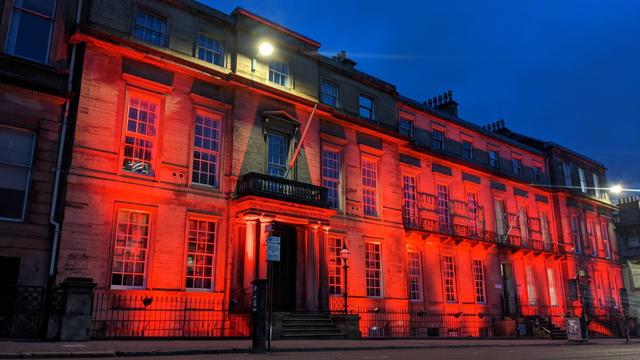 College building lit in red