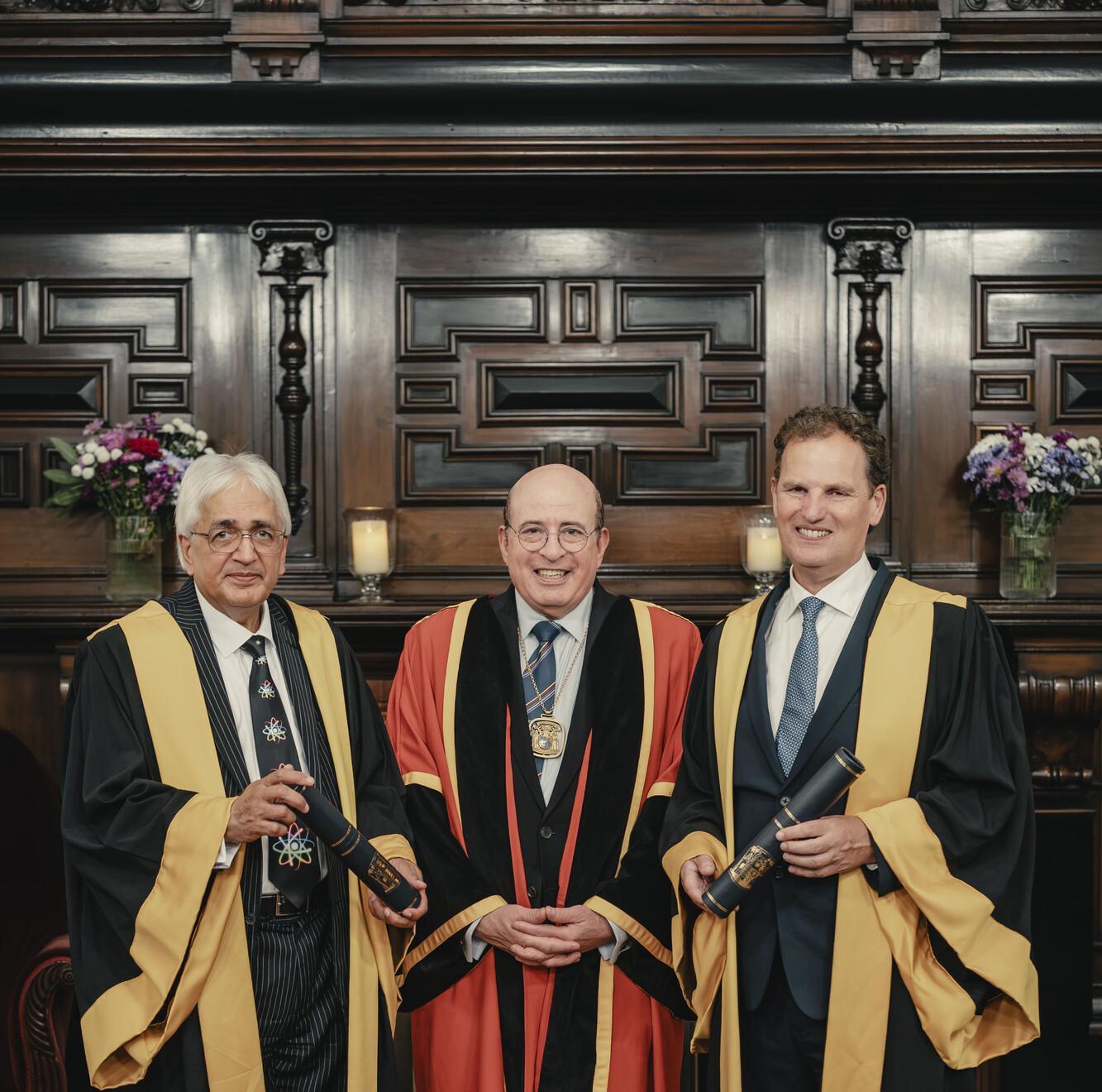 Professor Sir Alimuddin Zumla (left) and Professor Iain Blair McInnes (right) with College President Hany Eteiba (centre) at our Diploma Ceremony