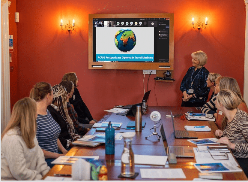 A group looking at a presentation